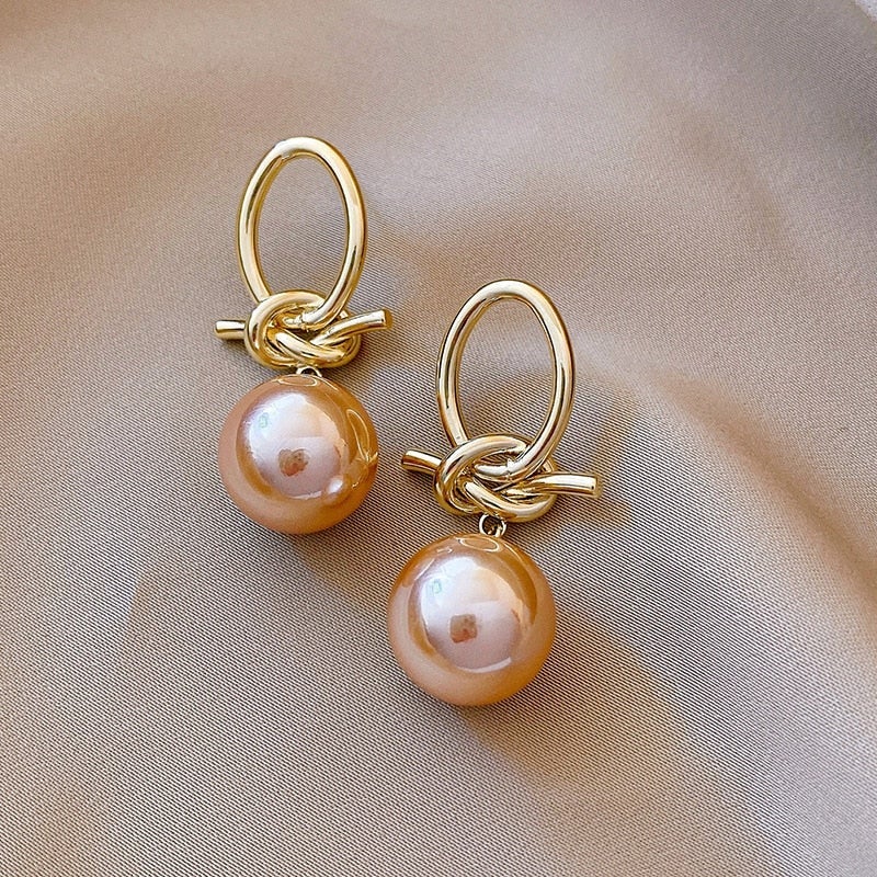 Boucles d'oreilles en perles dorées