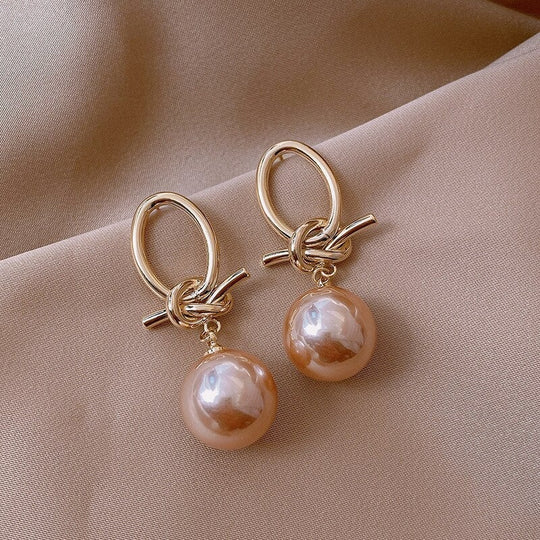 Boucles d'oreilles en perles dorées